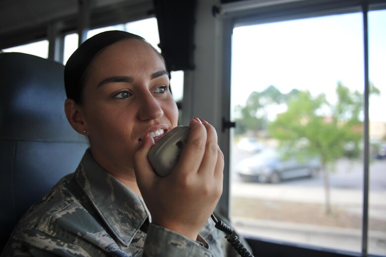 Senior Airman Lisa Exline, a vehicle operator with the 1st Special Operations Logistics Readiness Squadron, relays a message to dispatchers at the Vehicle Operation Control Center at Hurlburt Field, Fla., July 15, 2016. The 1st SOLRS transports Air Commandos to events such as changes of command, Operation Homecoming and other base events. (U.S. Air Force photo by Airman Dennis Spain)
