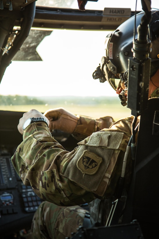 U.S. Army National Guard Warrant Officer Nathaniel Scott, F Company, 2-238th General Support Aviation Battalion, West Bend, Wis., 
prepares to take flight in a UH-60 Blackhawk helicopter during Warrior Exercise (WAREX) 86-16-03 at Fort McCoy, Wis., July 14, 2016. WAREX is designed to keep soldiers all across the United States ready to deploy. (U.S. Army photo by Sgt. Robert Farrell/Released)