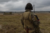 A combat controller with the 320th Special Tactics Squadron watches as Army Special Forces and Marine Raiders board a CH-47 Chinook after a multi-aircraft, joint airborne operation with special operations assets and conventional forces from all four branches of the U.S. Armed Forces as part of Rim of the Pacific (RIMPAC) 2016 to strengthen their relationships and interoperability with their partners, Pohakuloa Training Area, Hawaii, July 14, 2016. RIMPAC 2016 is the 25th exercise in the series that began in 1971.(U.S. Air Force photo by 2nd Lt. Jaclyn Pienkowski/Released)