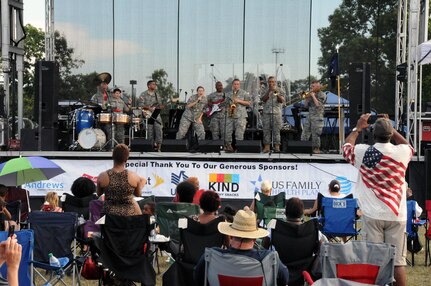 Soldiers of the U.S. Army Reserve's 319th Army Band stationed at Fort Totten, New York, perform July 15 at Joint Base McGuire-Dix-Lakehurst, New Jersey. The band was opening for Kool And The Gang as part of the JBMDL Summer Concert Series.