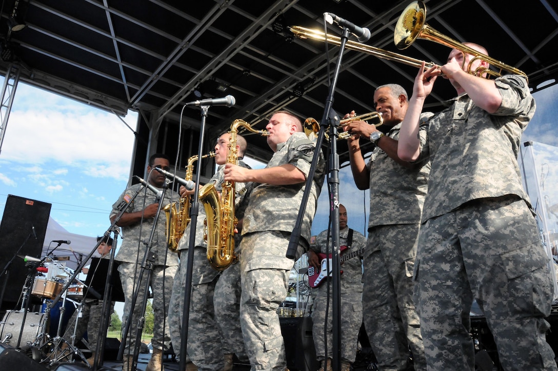 Soldiers of the U.S. Army Reserve's 319th Army Band stationed at Fort Totten, New York, perform July 15 at Joint Base McGuire-Dix-Lakehurst, New Jersey. The band was opening for Kool And The Gang as part of the JBMDL Summer Concert Series.