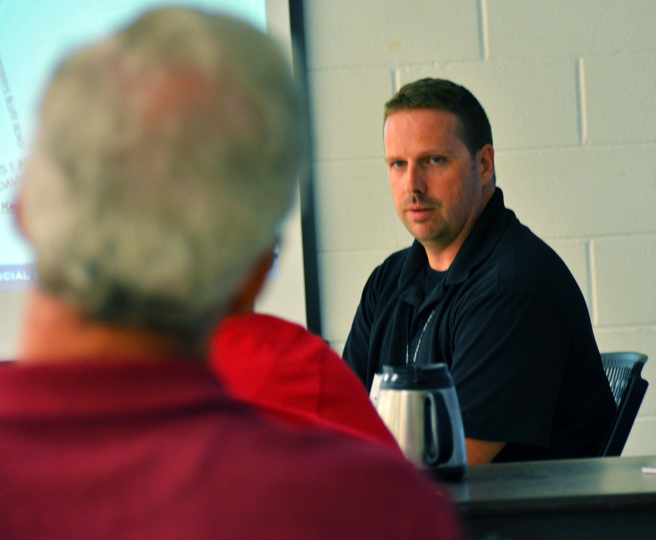 David Hufford, environmental engineer, Defense Logistics Agency Installation Support at Richmond, Virginia, answers a question during the quarterly Restoration Advisory Board meeting July 11, 2016, at the Bensley Community Center in Chesterfield County, Virginia. 