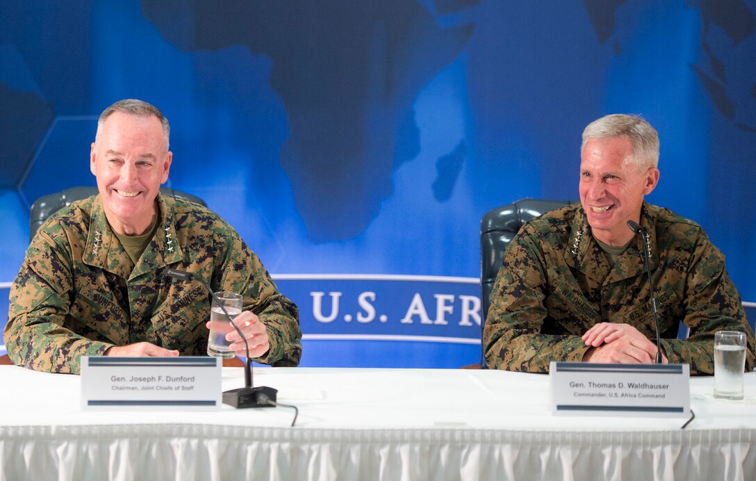 Marine Corps Gen. Joe Dunford, left, chairman of the Joint Chiefs of Staff, and Marine Corps Gen. Thomas D. Waldhauser, incoming commander of U.S. Africa Command, hold a press conference following the change-of-command ceremony at U.S. Army Garrison Stuttgart, Germany, July 18, 2016. DoD photo by Navy Petty Officer 2nd Class Dominique A. Pineiro