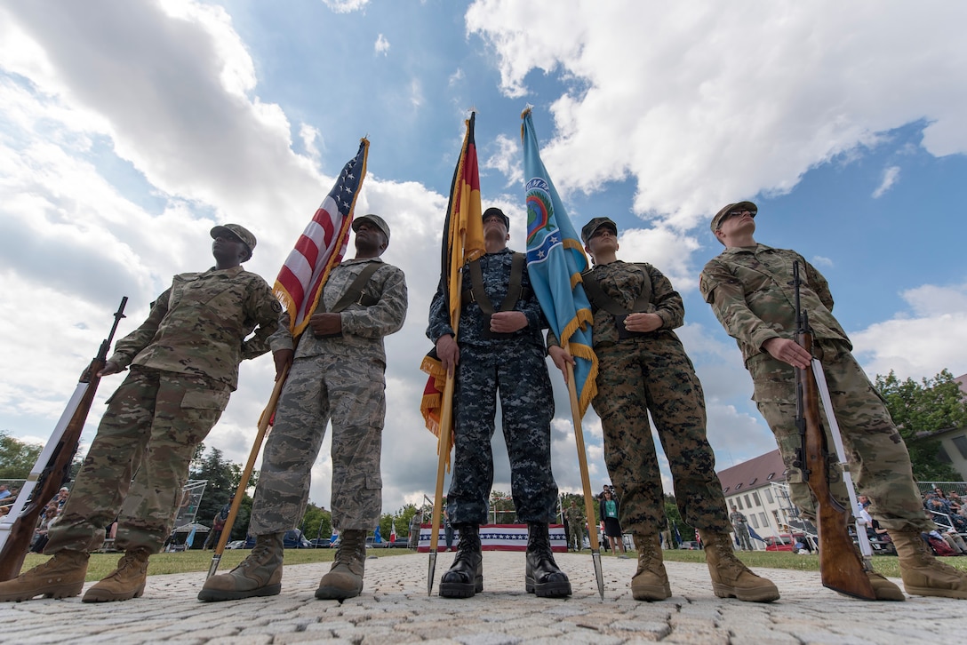 A Joint Forces color guard stand at attention before the U.S. Africa Command change-of-command ceremony at U.S. Army Garrison Stuttgart, Germany, July 18, 2016. Marine Corps Gen. Thomas D. Waldhauser assumed command from Army Gen. David M. Rodriguez, who will retire after 40 years of military service. DoD photo by Navy Petty Officer 2nd Class Dominique A. Pineiro