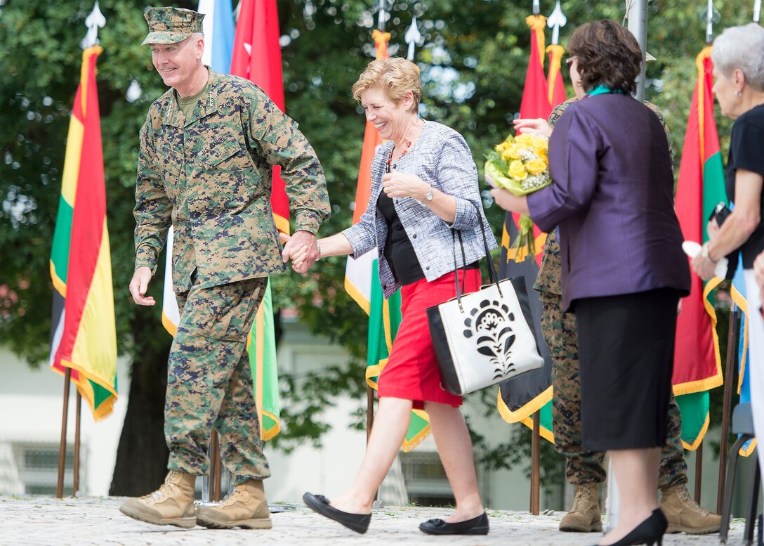 Marine Corps Gen. Joe Dunford, chairman of the Joint Chiefs of Staff, departs the U.S. Africa Command change-of-command ceremony with his wife, Ellyn, at U.S. Army Garrison Stuttgart, Germany, July 18, 2016. DoD photo by Navy Petty Officer 2nd Class Dominique A. Pineiro