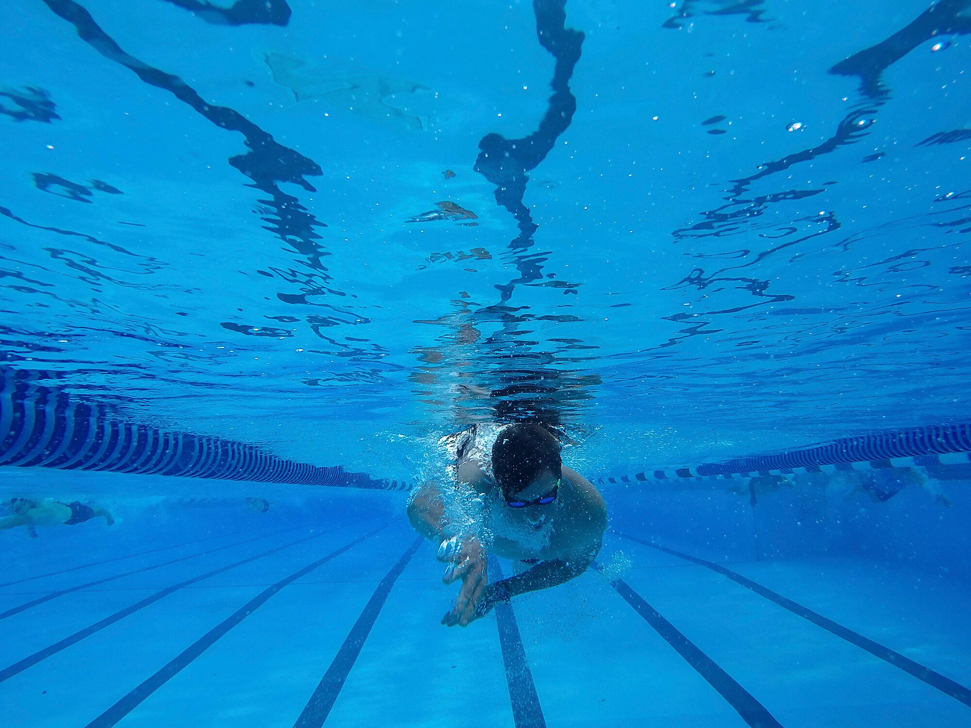 A Team Scott member completes the 300 meter swim during the “Splash N Dash” biathlon at Scott Air Force Base, Illinois, July 15, 2016. The biathlon started with 300 meter swim followed by a three mile run. The event had nearly 50 participants. Robert Wieland had the fastest time in the male category, 24 minutes 44 seconds, while Kimberly Wendt had the fastest time in the female category, 33 minutes 31 seconds. (U.S. Air Force photo by Tech. Sgt. Jonathan Fowler)
