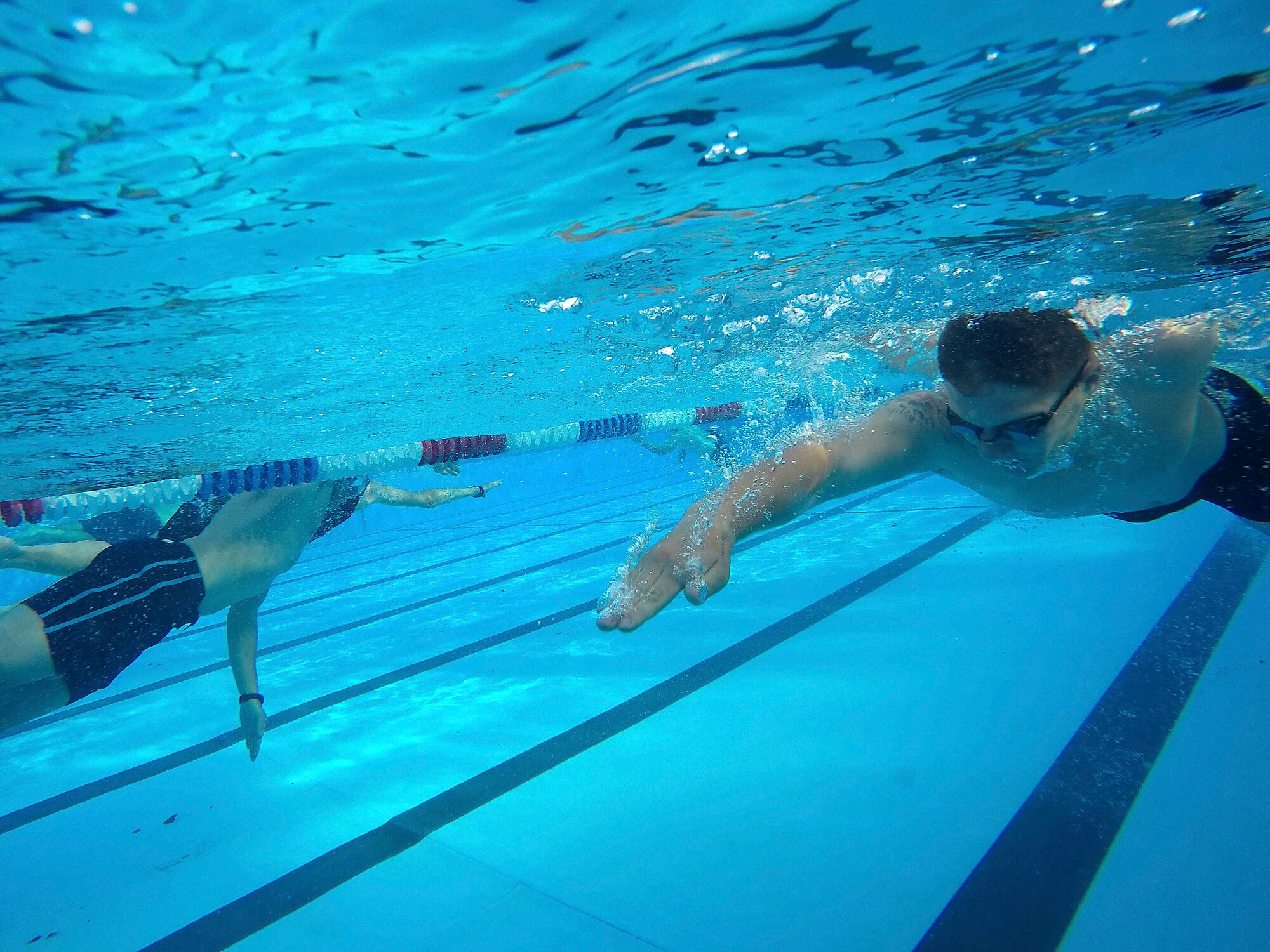 Team Scott members complete the 300 meter swim during the “Splash N Dash” biathlon at Scott Air Force Base, Illinois, July 15, 2016. The biathlon started with 300 meter swim followed by a three mile run. The event had nearly 50 participants. Robert Wieland had the fastest time in the male category, 24 minutes 44 seconds, while Kimberly Wendt had the fastest time in the female category, 33 minutes 31 seconds. (U.S. Air Force photo by Tech. Sgt. Jonathan Fowler)