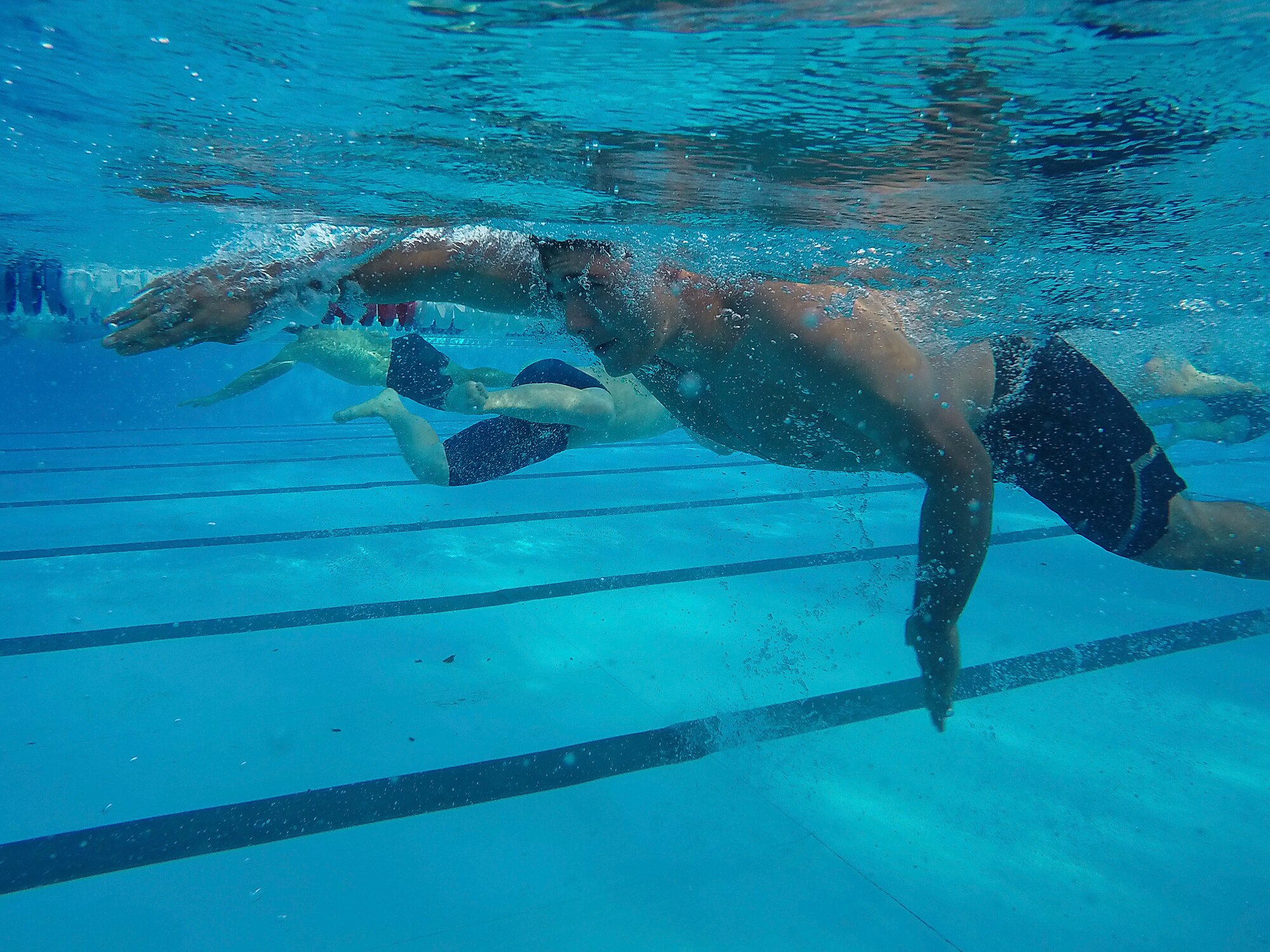 Team Scott members complete the 300 meter swim during the “Splash N Dash” biathlon at Scott Air Force Base, Illinois, July 15, 2016. The biathlon started with 300 meter swim followed by a three mile run. The event had nearly 50 participants. Robert Wieland had the fastest time in the male category, 24 minutes 44 seconds, while Kimberly Wendt had the fastest time in the female category, 33 minutes 31 seconds. (U.S. Air Force photo by Tech. Sgt. Jonathan Fowler)