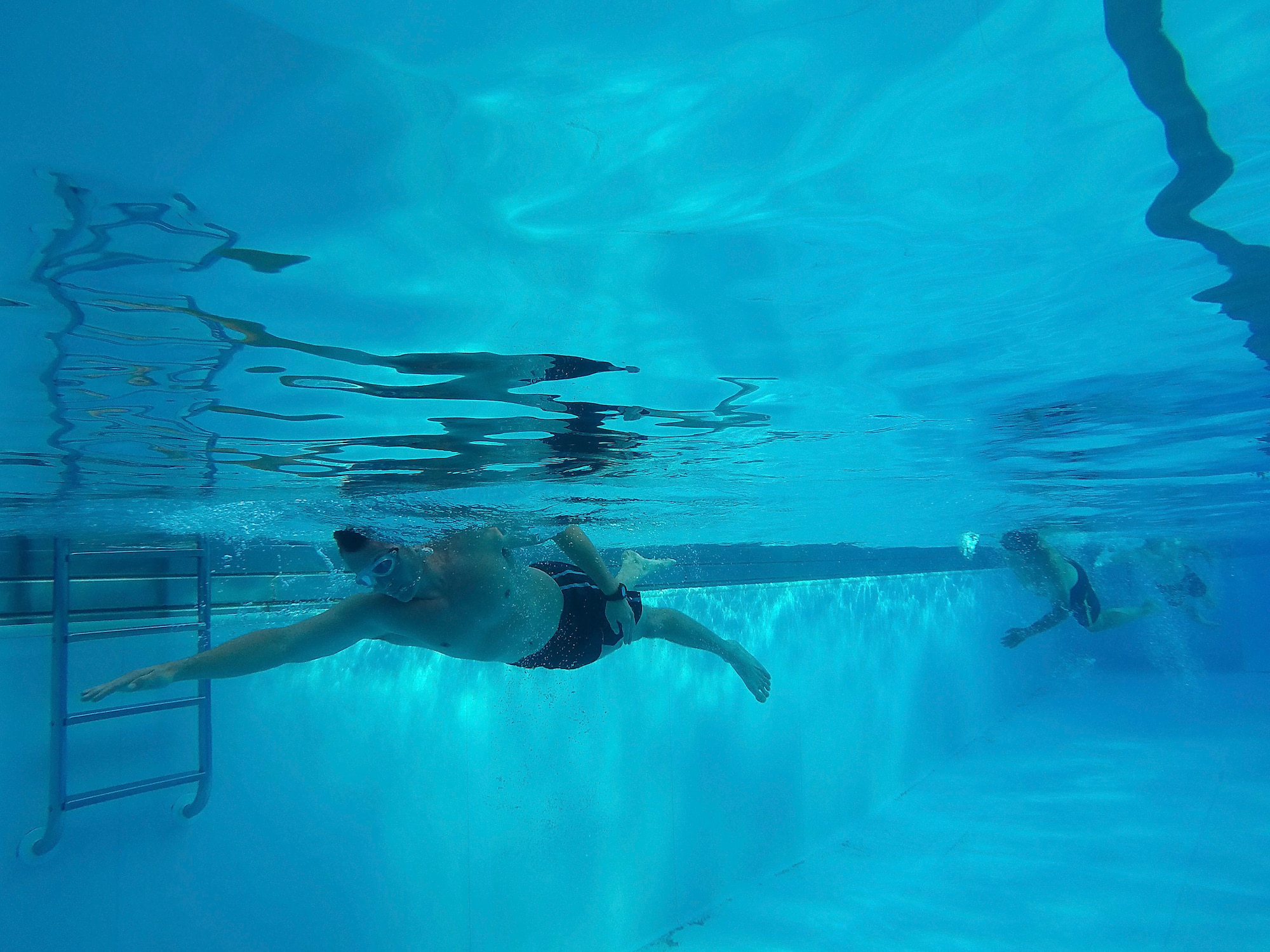 Team Scott members complete the 300 meter swim during the “Splash N Dash” biathlon at Scott Air Force Base, Illinois, July 15, 2016. The biathlon started with 300 meter swim followed by a three mile run. The event had nearly 50 participants. Robert Wieland had the fastest time in the male category, 24 minutes 44 seconds, while Kimberly Wendt had the fastest time in the female category, 33 minutes 31 seconds. (U.S. Air Force photo by Tech. Sgt. Jonathan Fowler)