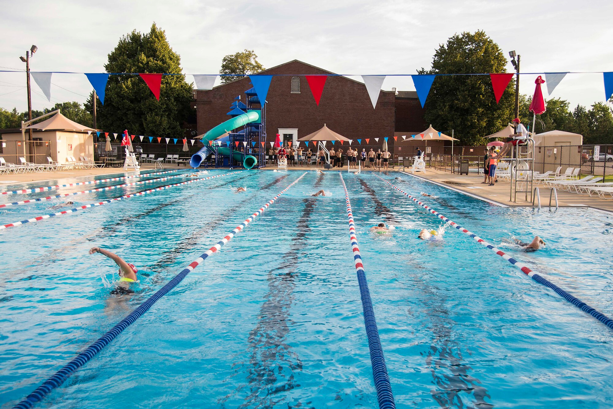 Team Scott members participate in a 300 meter swim during the “Splash N Dash” biathlon at Scott Air Force Base, Illinois, July 15, 2016. The biathlon required members to complete a 300 meter swim followed by a three mile run. Robert Wieland had the fastest time in the male category, 24 minutes 44 seconds, while Kimberly Wendt had the fastest time in the female category, 33 minutes 31 seconds. (U.S. Air Force photo by Tech. Sgt. Jonathan Fowler)