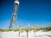 A sea turtle nest incubates near the 300-foot tower facility on the Santa Rosa Island Range July 14 at Eglin Air Force Base, Fla. The 96th Civil Engineer Group’s Jackson Guard biologists and volunteers track and monitor the endangered species’ activity on the littoral range. The information they gather is used to avoid and protect wildlife during military test and training missions. (U.S. Air Force photo/Ilka Cole) 