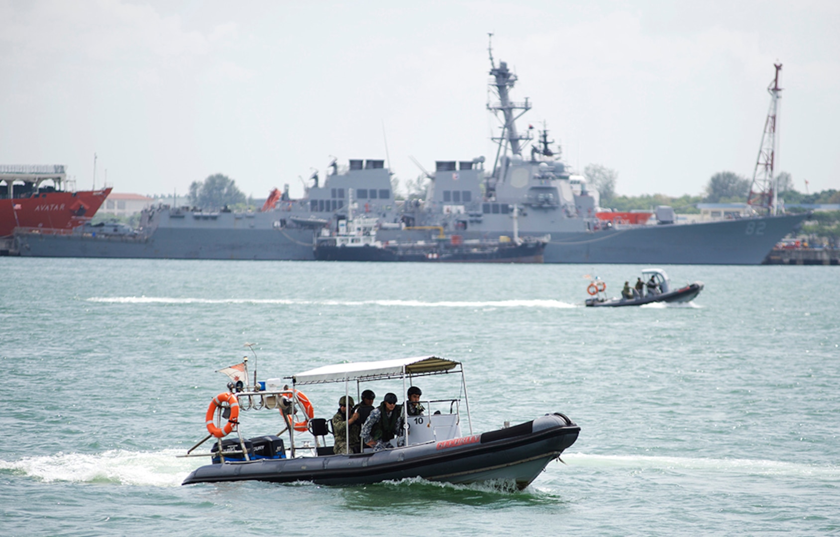 In this file photos, sailors assigned to Coastal Riverine Squadron 3 and members of the Republic of Singapore Navy exchange visit, board, search and seizure (VBSS) techniques during Cooperation Afloat Readiness and Training (CARAT) Singapore 2015. In its 21st year, CARAT is an annual, bilateral exercise series with the U.S. Navy, U.S. Marine Corps and the armed forces of nine partner nations including, Bangladesh, Brunei, Cambodia, Indonesia, Malaysia, the Philippines, Singapore, Thailand and Timor-Leste. 