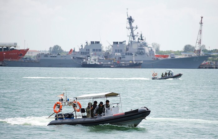 In this file photos, sailors assigned to Coastal Riverine Squadron 3 and members of the Republic of Singapore Navy exchange visit, board, search and seizure (VBSS) techniques during Cooperation Afloat Readiness and Training (CARAT) Singapore 2015. In its 21st year, CARAT is an annual, bilateral exercise series with the U.S. Navy, U.S. Marine Corps and the armed forces of nine partner nations including, Bangladesh, Brunei, Cambodia, Indonesia, Malaysia, the Philippines, Singapore, Thailand and Timor-Leste. 