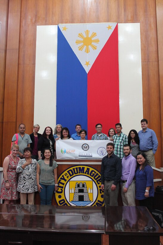 American and Filipino participants in the EMPOWER program meet members of the Dumaguete Effata Association of the Deaf, Philippine Federation of the Deaf, and Discovering Deaf Worlds, at the Damaguete City, Philippines, mayor’s office. The visit was part of a professional exchange program designed to build capacity among the Filipino deaf community. 