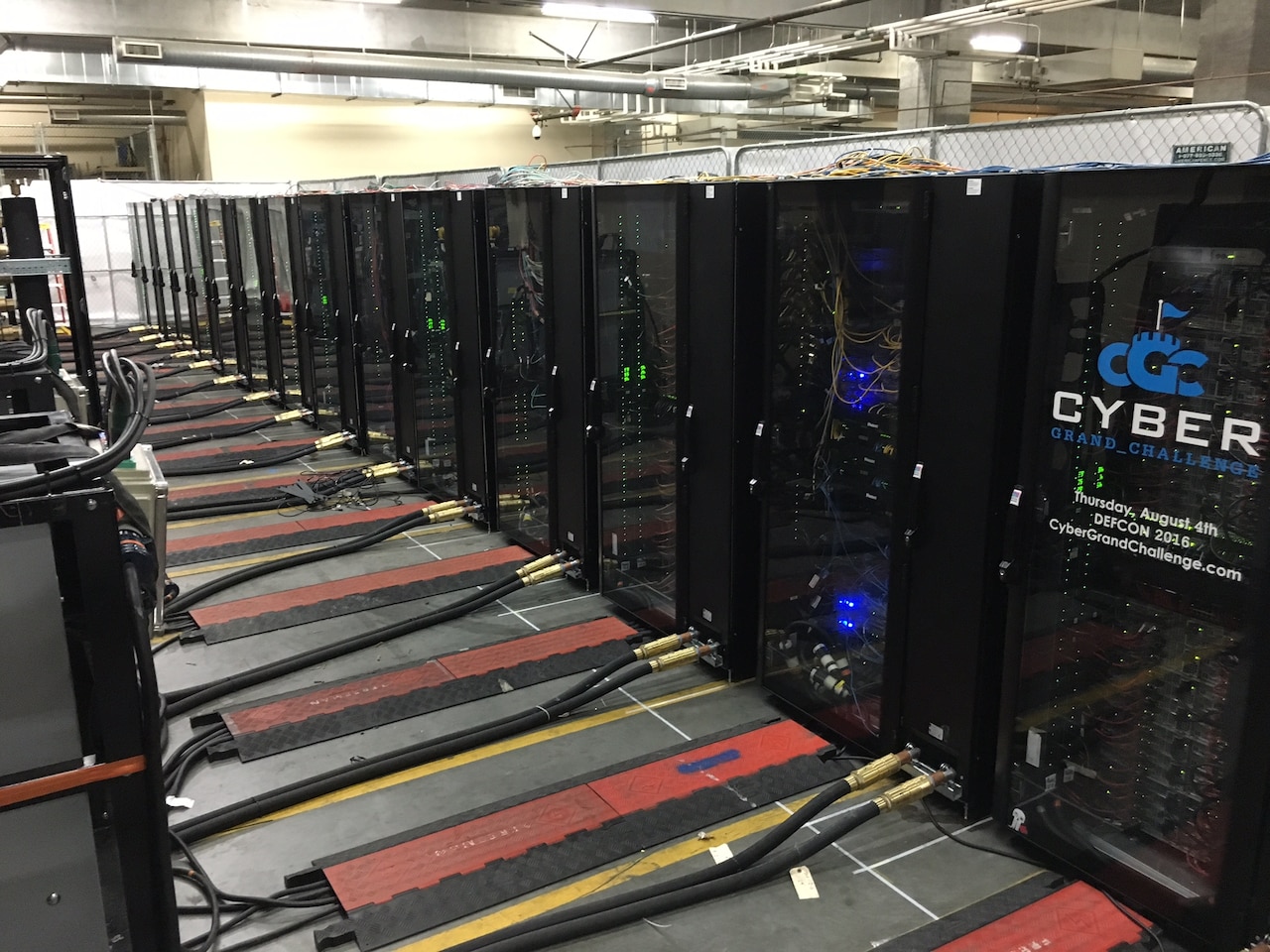These racks, with cooling and power, will hold servers for the autonomous computer systems that will compete in the Defense Advanced Research Projects Agency’s Cyber Grand Challenge finals in Las Vegas, Aug. 4, 2016. DARPA photo