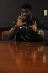 Herschel Walker, former NFL running back, speaks to the 2nd Medical Group Airmen at Barksdale Air Force Base, La., July 11, 2016. Walker talked to Airmen about his experience requesting help and told them not to be ashamed to ask for help. (U.S. Air Force photo/Airman 1st Class Stuart Bright)