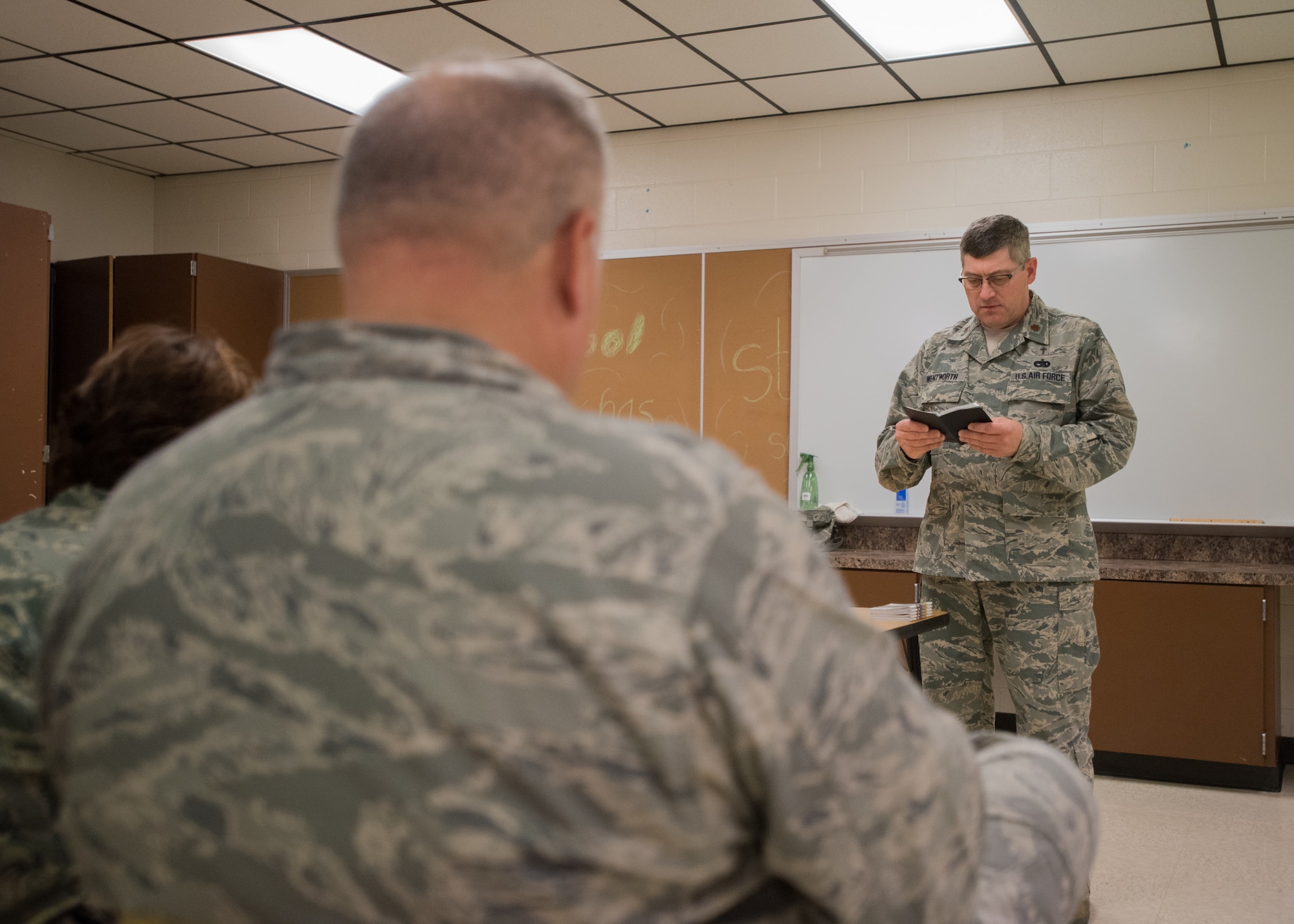 U.S. Air Force Chaplain Kerry Wentworth, of the 123rd Airlift Wing, Kentucky Air National Guard, leads a religious service for military members at Carlisle County High School in Bardwell, Ky., July 17, 2016, during the Bluegrass Medical Innovative Readiness Training. The program will offer medical and dental care at no cost to residents in three Western Kentucky locations from July 18 to 27.(U.S. Air National Guard photo by Master Sgt. Phil Speck)