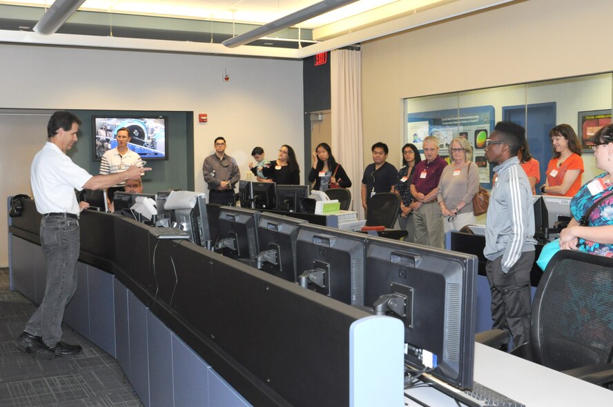 Family members of Tunnel 9 staff were recently invited to tour AEDC White Oak in Silver Spring, Md., during the site's annual Family Day. AEDC White Oak Site Director Dan Marren, pictured left, speaks to the group in the Tunnel 9 control room. (U.S. Air Force photo/Robert W. Mitchell)