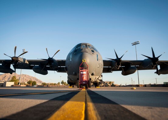 An HC-130 from Davis-Monthan Air Force Base, Arizona, sits idly on the Nellis flightline before preparing to take-off for a training sortie during Red Flag 16-3 July 13. With the HC-130 providing transport to the 79th Rescue Squadron during the exercise, the aircraft is able to deliver the RQS airman to the destination during the exercises while also being able to perform supply drops into the field. (U.S. Air Force photo by Senior Airman Jake Carter)