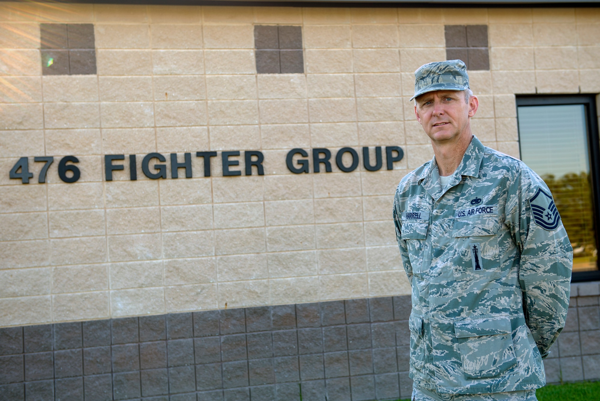 U.S. Air Force Reserve Master Sgt. Rusty Harrell, 476th Fighter Group career assistance advisor, poses in front of the 476th FG building, July 14, 2016, at Moody Air Force Base, Ga. Once an active duty armament systems technician, Harrell now holds the responsibility of guiding approximately 240 Airmen from the 476th FG through their career paths and future endeavors. (U.S. Air Force photo by Airman 1st Class Greg Nash)