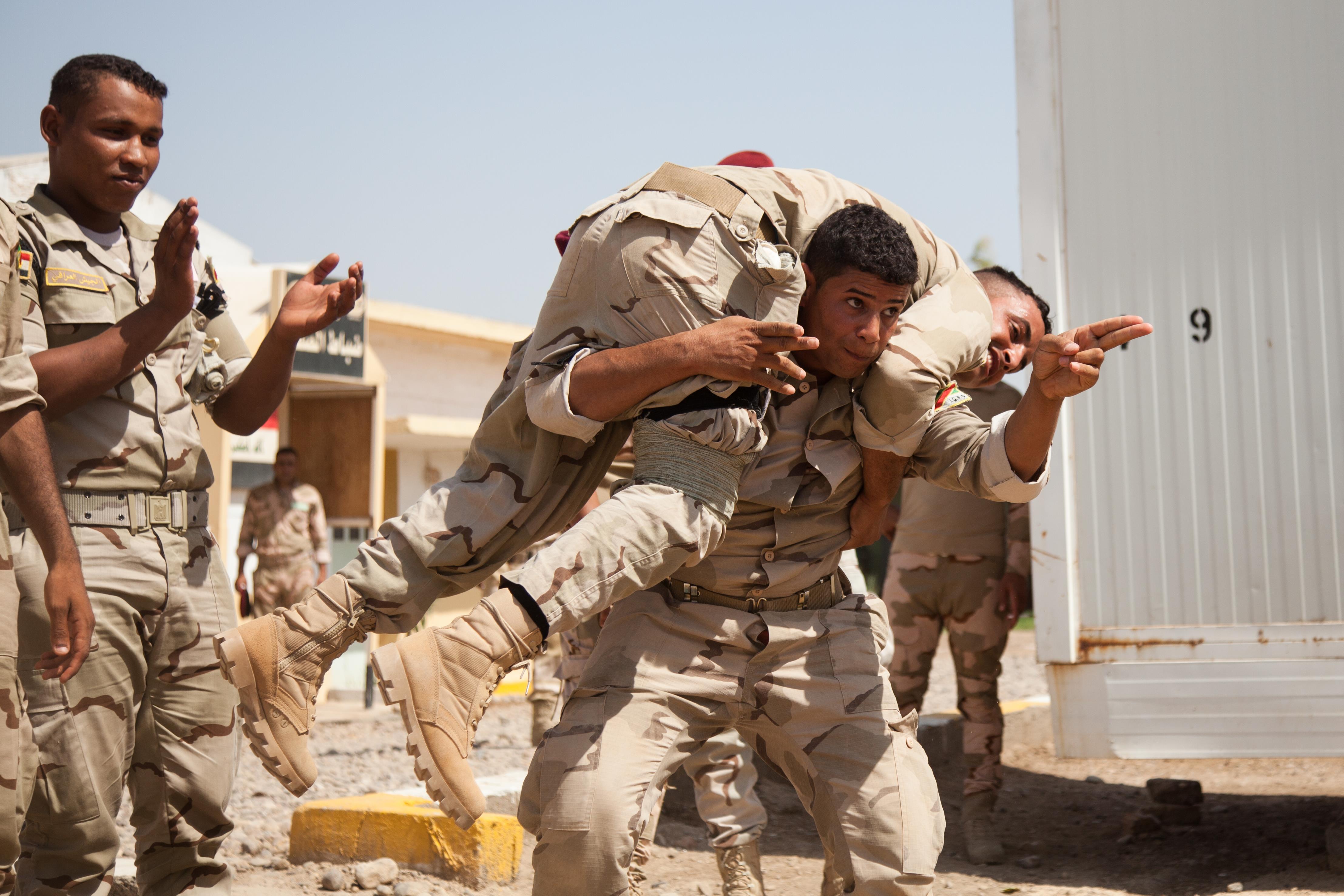 Coalition partners train Iraqi soldiers on combat lifesaving techniques