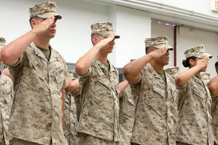 NAVAL SUPPORT FACILITY INDIAN HEAD, MD -- Marines and sailors with Headquarters and Service Company, Chemical Biological Incident Response Force, CBIRF, render a salute during a change of command ceremony at Naval Support Facility Indian Head, Md., July 13, 2016. Capt. Robert G. Ukrainec assumed command from Capt. Lucas H. Forcella, and the two gave remarks during the ceremony thanking their leadership and families. (Official USMC Photo by Sgt. Jonathan S. Herrera/Released)
