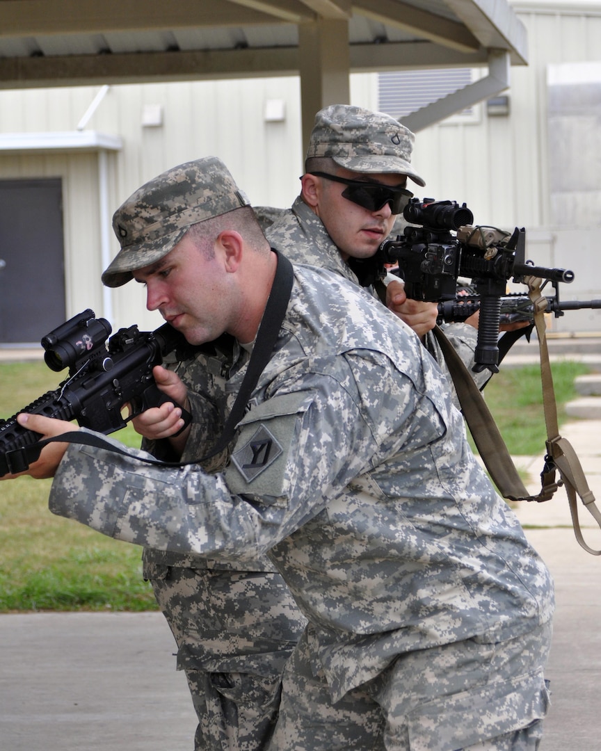 Rhode Island Army National Guard Pfcs. Adam Tighe and Christopher Comery, assigned to Co. A, 1st Battalion, 182nd Infantry, East Greenwich, R.I., rehearse infantry techniques at the Army’s Joint Readiness Training Center, Fort Polk, Louisiana, July 13, 2016.  The infantrymen join more than 5,000 Soldiers from other state Army National Guard units, active Army and Army Reserve troops as part of the 27th Infantry Brigade Combat Team task force.  