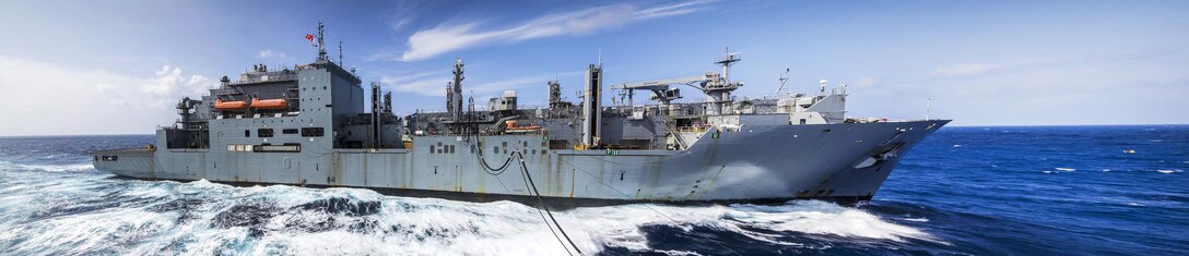 The USNS Wally Schirra steams alongside hospital ship USNS Mercy during a replenishment at sea in the South China Sea, July 13, 2106. Navy photo by Australian Air Force Cpl. David Cotton