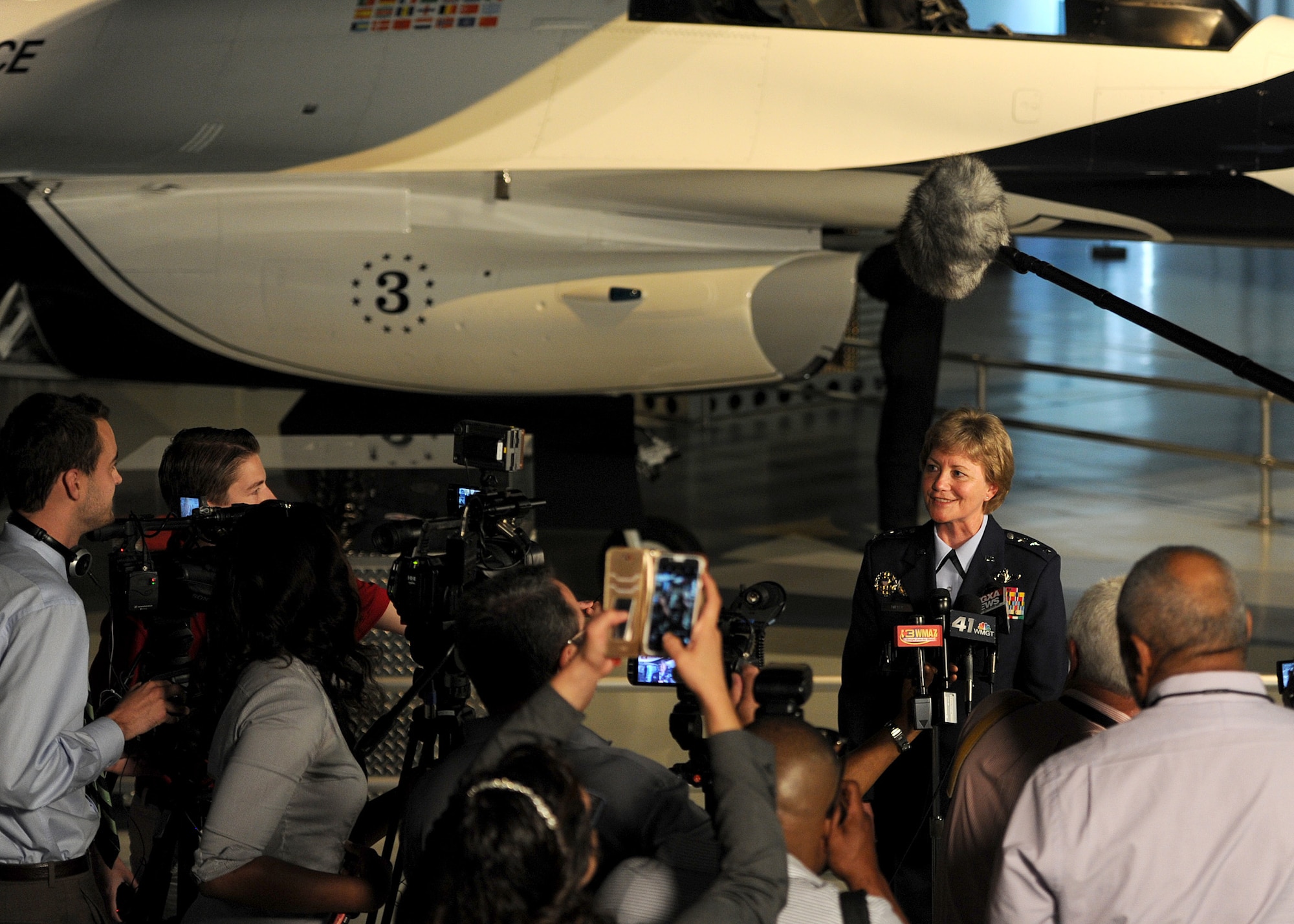 Newly appointed commander of Air Force Reserve Command, Lt. Gen. Maryanne Miller, talks with the media after her change of command ceremony at the Museum of Aviation in Warner Robins, Ga., July 15, 2016. Miller became the first female to assume command of AFRC. (U.S. Air Force photo by Tech. Sgt. Stephen D. Schester)