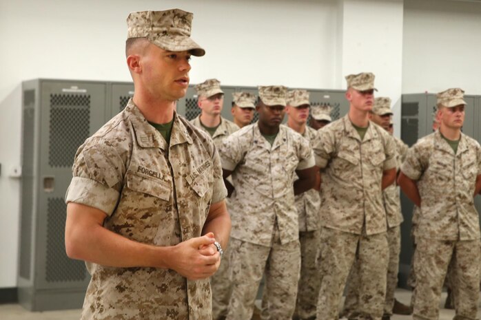 NAVAL SUPPORT FACILITY INDIAN HEAD, MD -- Capt. Lucas H. Forcella, outgoing company commander with Headquarters and Service Company, Chemical Biological Incident Response Force, CBIRF, gives remarks during a change of command ceremony at Naval Support Facility Indian Head, Md., July 13, 2016. Forcella thanked his family for support during his tour at CBIRF and said it was an honor to lead the Marines and sailors of the company. (Official USMC Photo by Lance Cpl. Maverick S. Mejiacabrera/Released)
