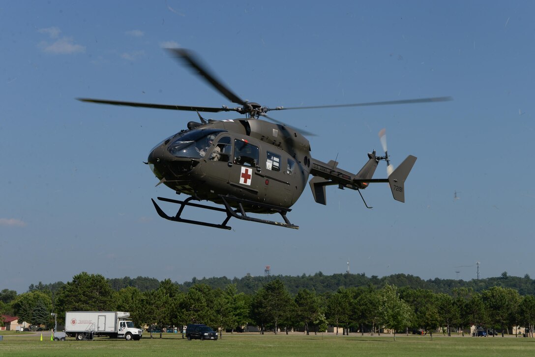 A Nebraska Army National Guard UH-72 Lakota Helicopter transports a simulated patient during Exercise Patriot North 2016 at Volk Field Air National Guard Base, Wis.,July 18, 2016. Air National Guard photo by Senior Master Sgt. David H. Lipp