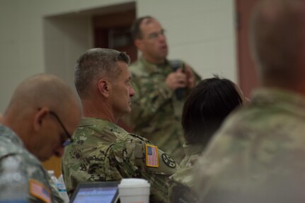 Maj. Gen. Jeffrey Holmes, deputy adjutant general for the Tennessee National Guard, listens on as speakers present their briefings during the Engineer Total Planning Exercise (ENTAPE). ENTAPE is an exercise that brings together the senior engineer leadership from all components of the Army, in order to network, plan, and coordinate future capabilities. (U.S. Army photo by Staff Sgt. Jason Proseus/Released)