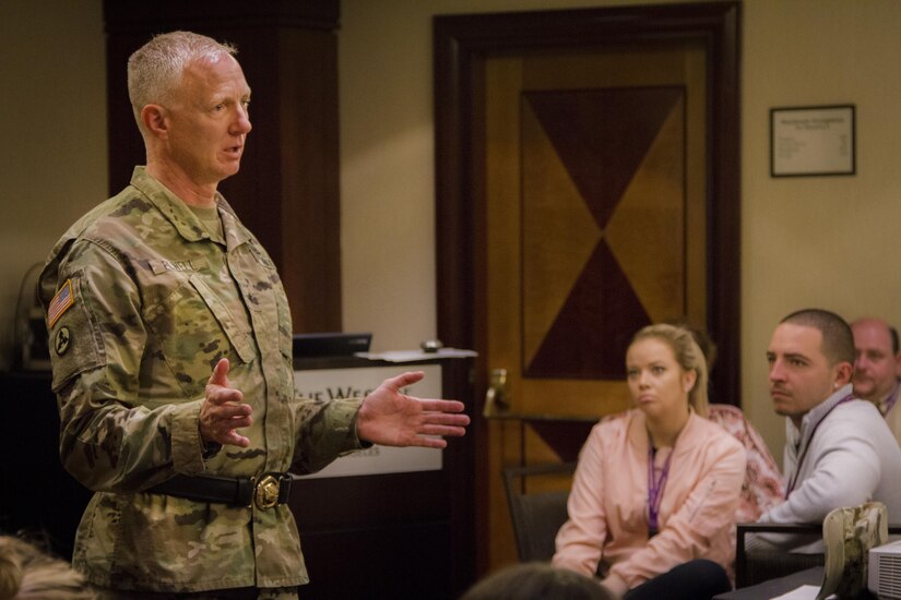 Brig. Gen. David Elwell, 311th Sustainment Command (Expeditionary) addresses 376th Human Resources Company and 314th Combat Sustainment Support Battalion Soldiers and families at a Yellow Ribbon event at the Westin Bonaventure, Los Angeles, Calif. about their upcoming deployment. Yellow Ribbon events provide resources, training, and support to family members of Soldiers deployed overseas. July 17, 2016. (U.S. Army photo by CPL Timothy Yao, 311th ESC Public Affairs/Released)