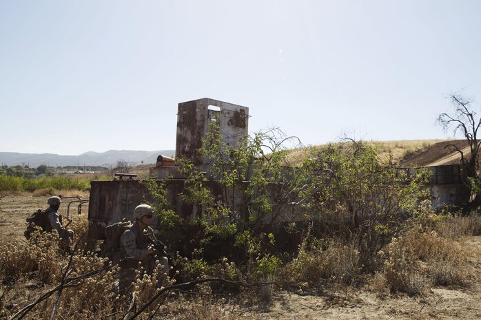 Marines with 5th Marine Regiment, 1st Marine Division provide security during a patrol for the 1st Marine Division Infantry Squad Competition July 13, 2016 at Camp Pendleton, California. The 1st Marine Division hosted their annual Infantry Squad or “Super Squad” competition which pits the 1st, 5th and 7th Marine Regiments and a Light Armored Reconnaissance Battalion against each other in tests designed to evaluate their leadership and small unit infantry skills. (U.S. Marine Corps photo by Sgt. Abbey Perria)