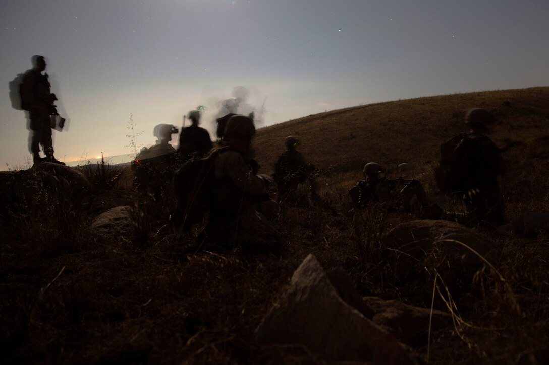 Marines with 5th Marine Regiment, 1st Marine Division move towards defensive positions during the 1st Marine Division Infantry Squad Competition July 14, 2016 at Camp Pendleton, California. The 1st Marine Division hosted their annual Infantry Squad or “Super Squad” competition which pits the 1st, 5th and 7th Marine Regiments and a Light Armored Reconnaissance Battalion against each other in tests designed to evaluate their leadership and small unit infantry skills. (U.S. Marine Corps photo by Sgt. Abbey Perria)