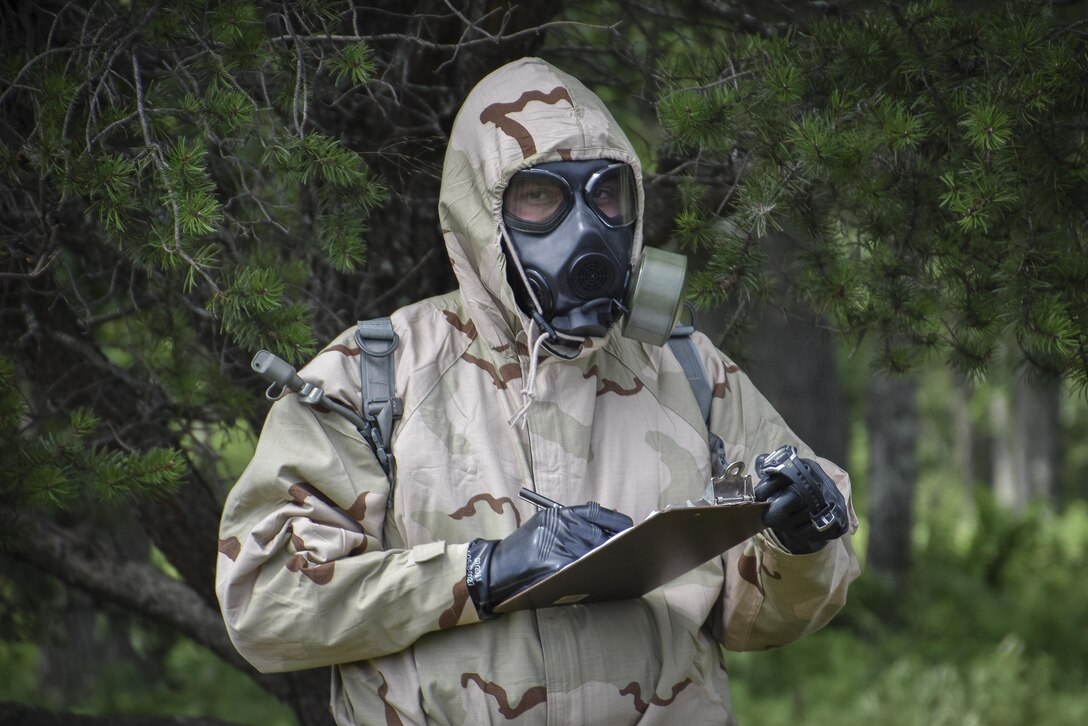 A U.S. Army Reserve solider with the 401st Chemical Company out of Boston, Mass., observes an equipment decontamination mission at Red Dragon on Fort McCoy, Wis., July 17, 2016.  Red Dragon is an annual Army Reserve chemical, biological, radiological and nuclear training exercise led by the 415th CBRN Brigade out of Greenville, South Carolina consisting of over 750 soldiers.(U.S. Army photo by Master Sgt. Marisol Walker/Released)