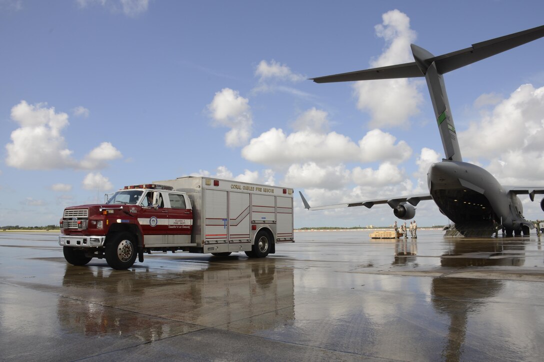 A fire rescue vehicle waits to be loaded onto a C-17 Globemaster II La Antigua, Guatemala, July 17. This was the second fire rescue vehicle that was shipped out of Homestead ARB to a La Antigua. The first was shipped in April. (U.S. Air Force photo by Senior Airman Frank Casciotta)