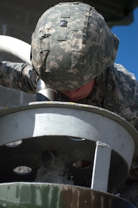 U.S. Army Spc. Cody Robinett, Headquarters and Headquarters Detachment, 172nd Medical Battalion, Ogden, Utah., fills a M-149 water buffalo with potable water for drinking during Warrior Exercise (WAREX) 86-16-03 at Fort McCoy, Wis., July 15, 2016. WAREX is designed to keep soldiers all across the United States ready to deploy. (U.S. Army photo by SPC Thomas Watters/Released)