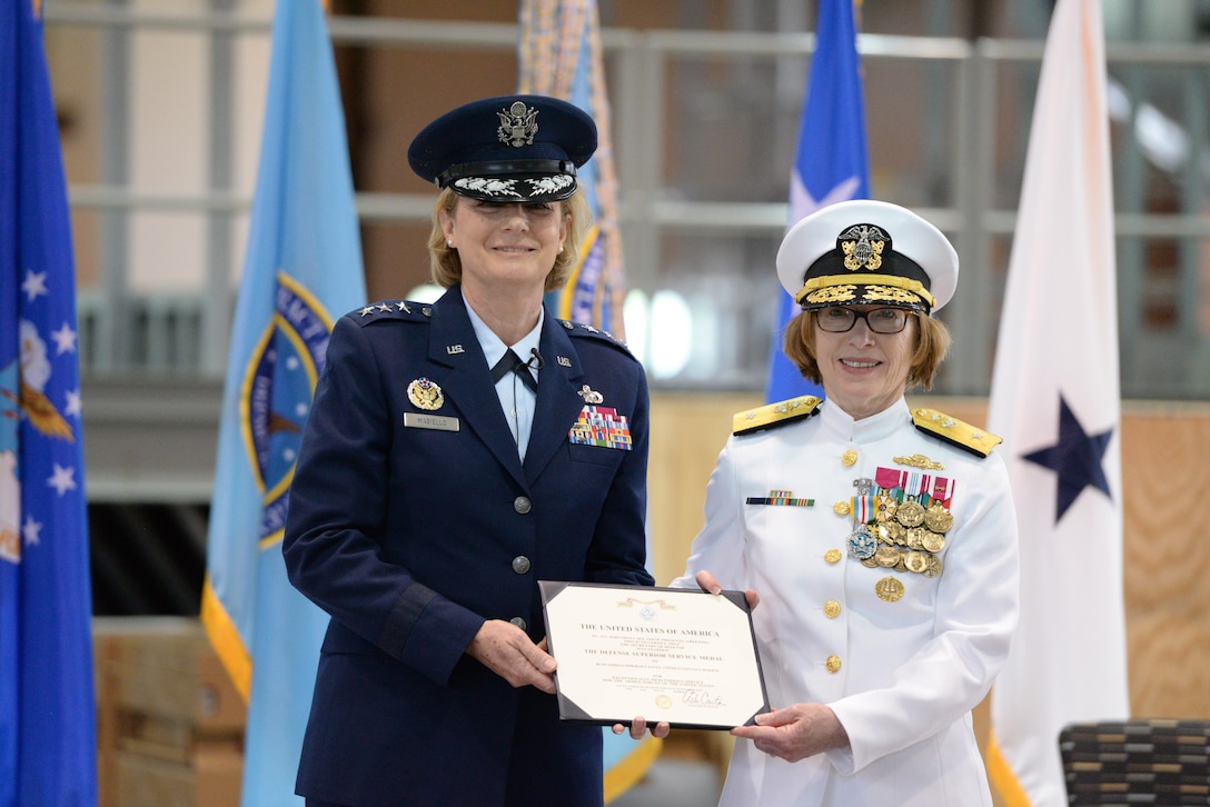 Defense Contract Management Agency director, Air Force Lt. Gen. Wendy Masiello, awards the Navy Defense Superior Service Medal to Navy Rear Adm. Deborah Haven for her three years of service as the DCMA International commander during a change of command ceremony at Fort Lee, Virginia, May 23. Haven will continue her service with the agency as the chief of staff.