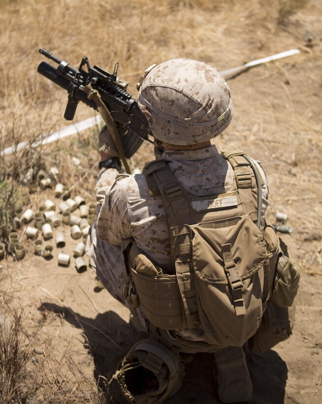 Lance Cpl. Chance A. Goff prepares to fire an M203 Grenade Launcher during a combat marksmanship course for 1st Marine Division’s annual Infantry Squad competitions. The competition pits squads from the 1st, 5th and 7th Marine Regiments along with one from a Light Armored Reconnaissance Battalion against one another in marksmanship, physical fitness and squad-level tactics. Goff, who placed first in the marksmanship competition, is a native of Fayette, Missouri and a rifleman with Company C, 1st Battalion, 7th Marine Regiment, 1st Marine Division. (U.S. Marine Corps Photo by Lance Cpl. Justin E. Bowles)