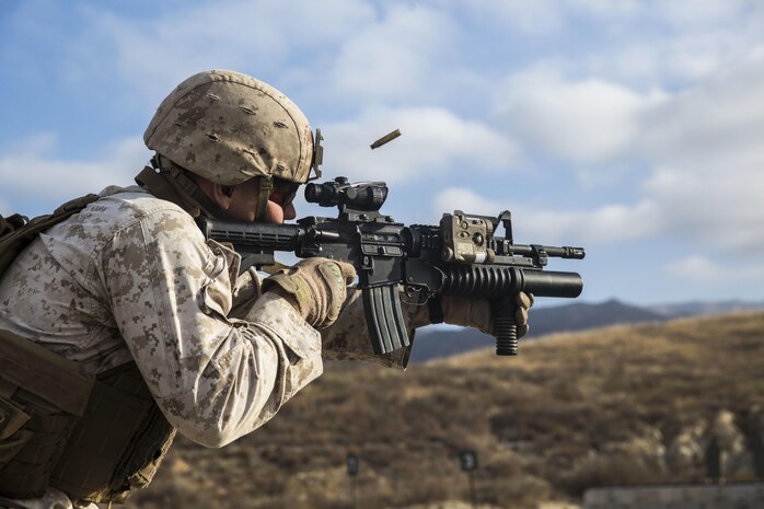 Lance Cpl. Mark Uriarte, a rifleman with 1st Battalion, 7th Marine Regiment, fires various drills on a live-fire range during a squad competition on Camp Pendleton, Calif., July 13, 2016. The 1st Marine Division hosted their annual Infantry Squad or “Super Squad” competition which pits the 1st, 5th, and 7th Marine Regiments and a Light Armored Reconnaissance Battalion against each other in tests designed to evaluate their leadership and small unit, infantry skills. (U.S. Marine Corps photo by Cpl. Jonathan Boynes)