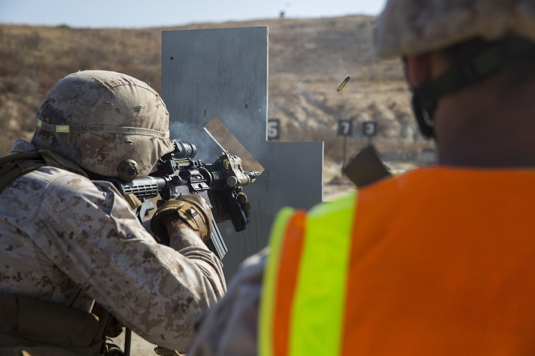 Lance Cpl. Scott Buschur, an infantryman with 3rd Light Armored Reconnaissance Battalion, fires at a target during a live-fire range aboard Camp Pendleton, Calif., July 12, 2016.  The 1st Marine Division hosted their annual Infantry Squad or “Super Squad” competition which pits the 1st, 5th, and 7th Marine Regiments and a Light Armored Reconnaissance Battalion against each other in tests designed to evaluate their leadership and small unit, infantry skills. (U.S. Marine Corps photo by Cpl. Jonathan Boynes)