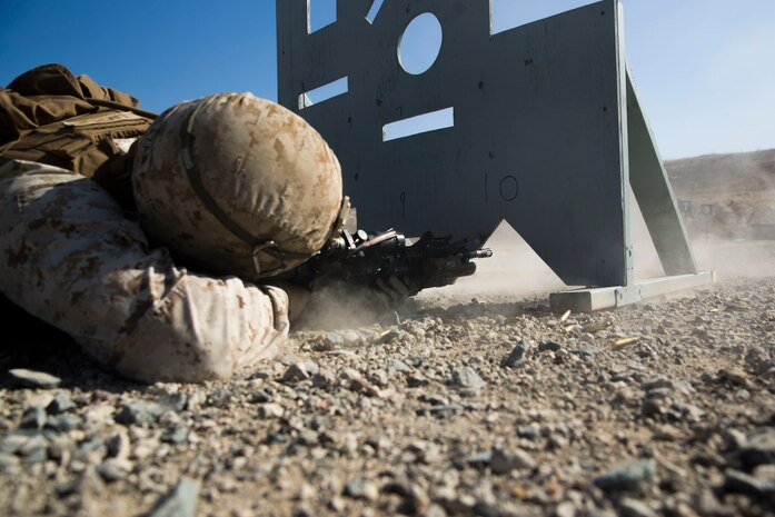 Lance Cpl. Omar Salazar, an infantryman with 1st Battalion, 5th Marine Regiment, fires at a target during a live-fire range aboard Camp Pendleton, Calif., July 12, 2016.  The 1st Marine Division hosted their annual Infantry Squad or “Super Squad” competition which pits the 1st, 5th, and 7th Marine Regiments and a Light Armored Reconnaissance Battalion against each other in tests designed to evaluate their leadership and small unit, infantry skills. (U.S. Marine Corps photo by Cpl. Jonathan Boynes)