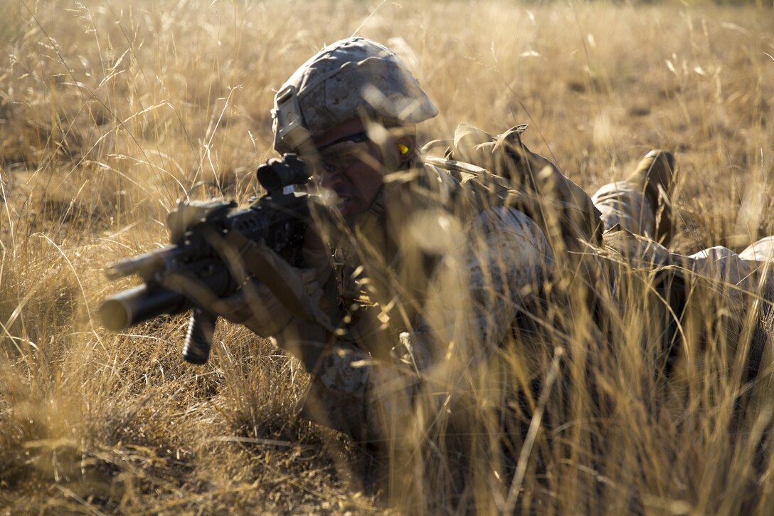 Lance Cpl. Jonathan Gray, a rifleman with 1st Battalion, 7th Marine Regiment, practices tactical maneuvers during a squad competition on Camp Pendleton, Calif., July 13, 2016. The 1st Marine Division hosted their annual Infantry Squad or “Super Squad” competition which pits the 1st, 5th, and 7th Marine Regiments and a Light Armored Reconnaissance Battalion against each other in tests designed to evaluate their leadership and small unit, infantry skills. (U.S. Marine Corps photo by Cpl. Jonathan Boynes)