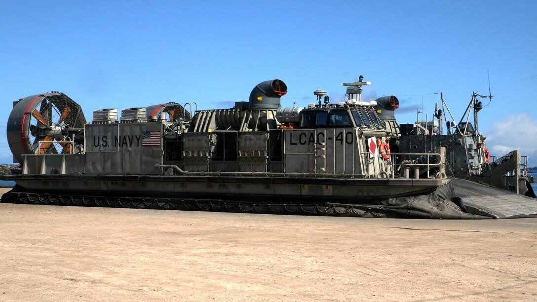A U.S. Navy Landing Craft Air Cushion is staged at a pier near Pohakuloa Training Area, Hawaii, July 15, 2016. The Sailors are participating in Rim of the Pacific 2016, a multinational exercise, from June 29 to Aug. 8 in and around the Hawaiian Islands. RIMPAC gives the U.S. military a unique opportunity to interact and build relationships with partners and allies in the Pacific Region.