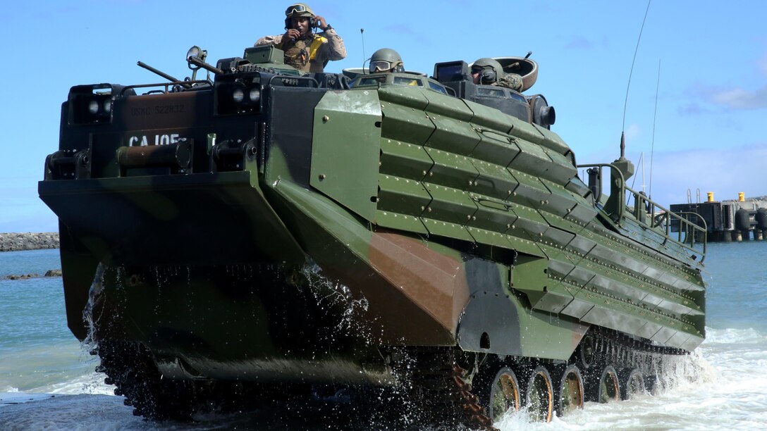 Marines with Battalion Landing Team 2nd Battalion, 3rd Marines land an Amphibious Assault Vehicle at a pier near Pohakuloa Training Area, Hawaii, July 15, 2016. The Marines are participating in Rim of the Pacific 2016, a multinational military exercise, from June 29 to Aug. 4 in and around the Hawaiian Island. RIMPAC gives the U.S. military a unique opportunity to interact and build relationships with partners and allies in the Pacific Region. 