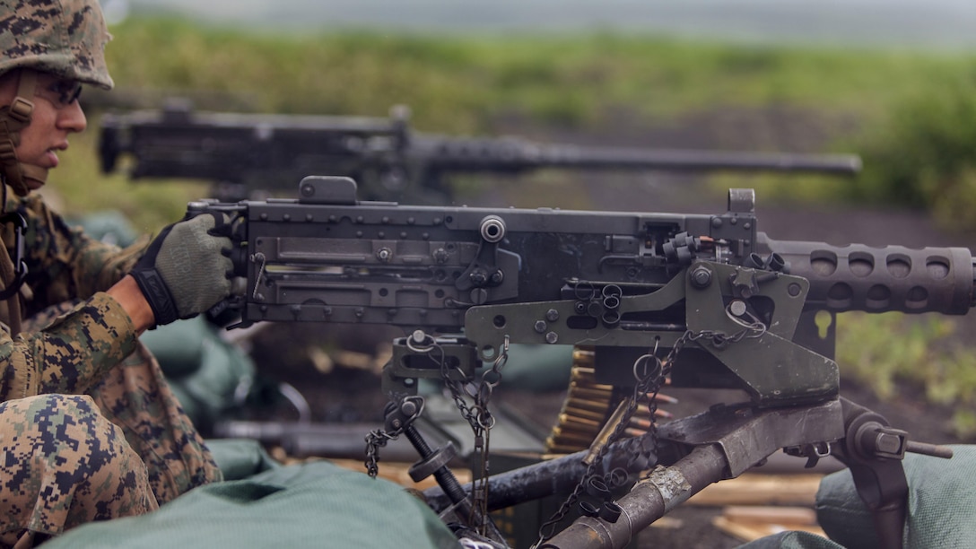 A U.S. Marine with Marine Wing Support Squadron 171 stationed at Marine Corps Air Station Iwakuni, Japan, shoots an M2 .50-caliber heavy-machine gun as part of a machine-gun range during exercise Eagle Wrath 2016 at Combined Arms Training Center Camp Fuji, July 16, 2016. The annual exercise focuses on providing aviation-ground support to an assigned aviation combat element while reinforcing skills that Marines learned throughout their military occupational specialty schooling and Marine Combat Training. The squadron plans to complete their unit annual training requirements throughout three stages, which focus on air base ground defense and Marine Corps common skills that Marines are unable to train for locally.