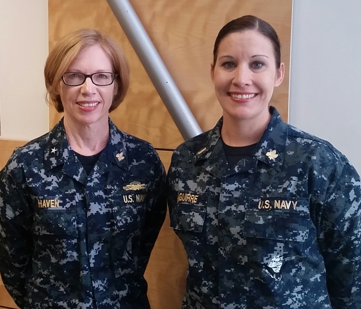 Navy Rear Adm. Deborah Haven, Defense Contract Management Agency International commander, and Navy Lt. j.g. Amy Aguirre (pictured as an Ensign), at Operational Contract Support Joint Exercise 2015 in Fort Bliss, Texas. Aguirre, a Navy reservist assigned to DCMA for the exercise, was in the Contingency Contract Administration Services cell at OCSJX-15.