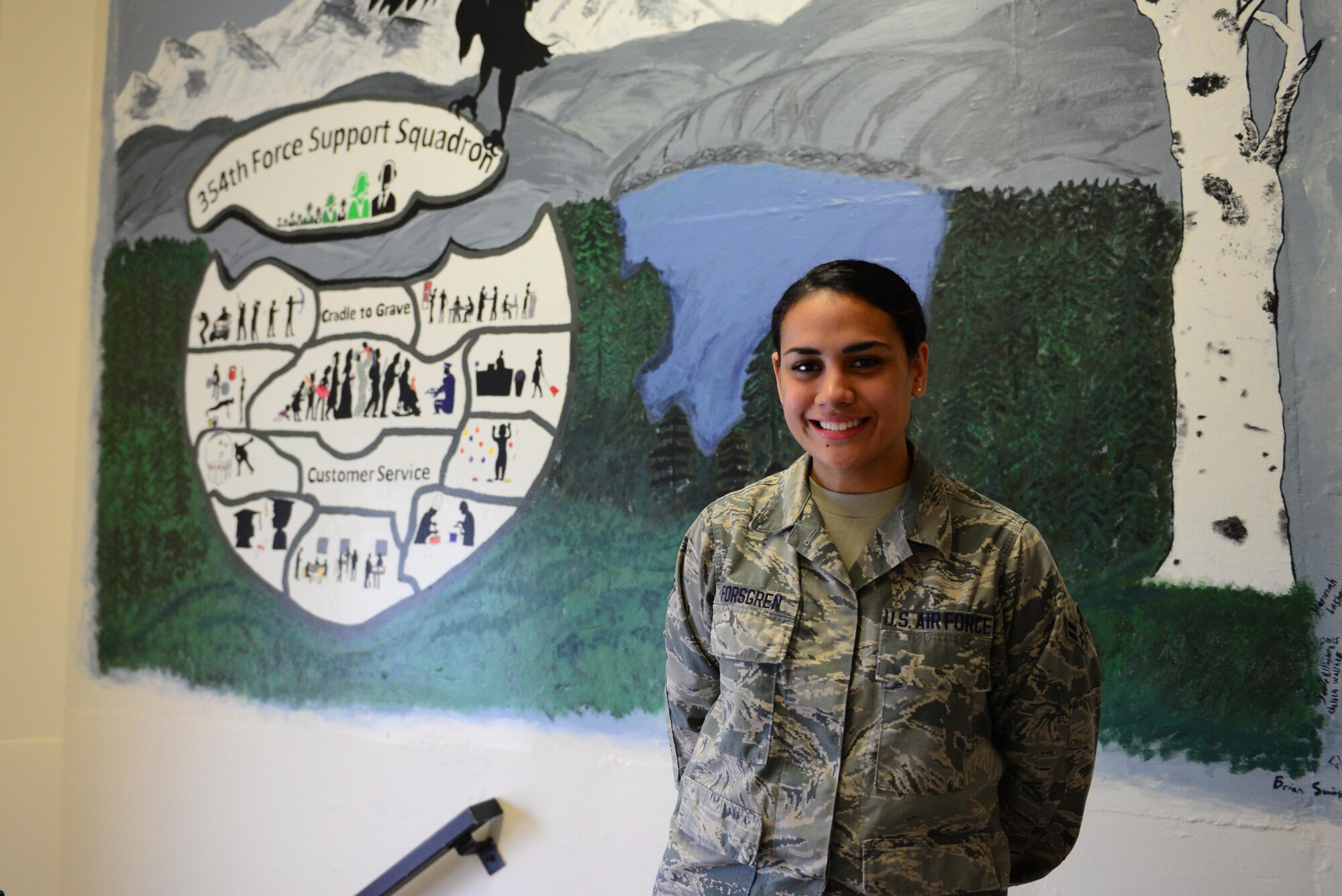 U.S. Air Force Airman 1st Class Nadine Forsgren, a 354th Force Support Squadron career development technician, takes a brief photo break July 18, 2016, at Eielson Air Force Base, Alaska. Forsgren said the Air Force helped carve a path for her future while giving her the opportunity to better herself. (U.S. Air Force photo by Airman 1st Class Cassandra Whitman)