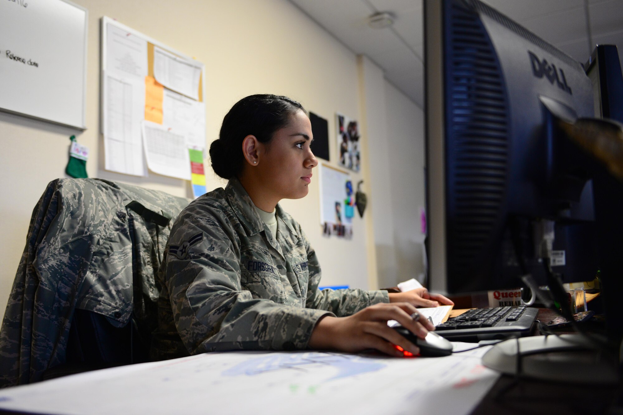 U.S. Air Force Airman 1st Class Nadine Forsgren, a 354th Force Support Squadron career development technician, responds to a customer request July 18, 2016, at Eielson Air Force Base, Alaska. Forsgren assists customers daily with permanent change of station orders, retirements and separations. (U.S. Air Force photo by Airman 1st Class Cassandra Whitman)